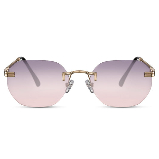 Rimless Γυαλιά ηλίου Sore από την Exposure Sunglasses με προστασία UV400 με χρυσό σκελετό και ροζ φακό.
