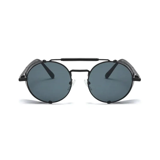 Στρογγυλά Γυαλιά ηλίου Goon της Exposure Sunglasses με προστασία UV400 σε μαύρο χρώμα σκελετού και μαύρο φακό.